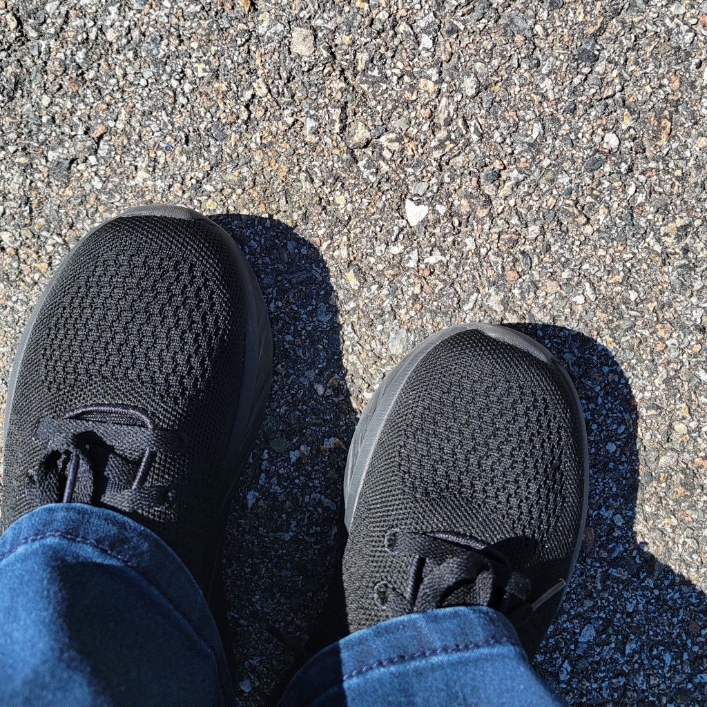 tiny heart rock embedded in the road